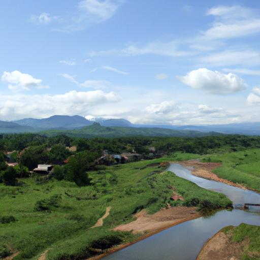 Hình ảnh tuyệt đẹp thể hiện vẻ đẹp tự nhiên của Kon Tum với những cánh đồng xanh mướt, dòng suối trong xanh và ngôi làng truyền thống.